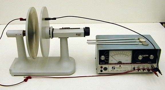 Capacitor Voltage vs. Plate Separation and Dielectric Constant